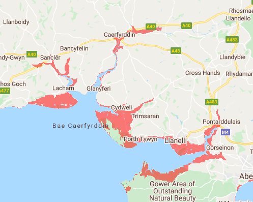 The annual coastal flood risk areas around Carmarthen Bay